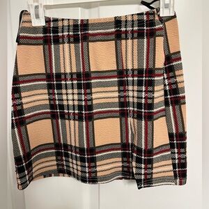 tan , white , black and red plaid skirt